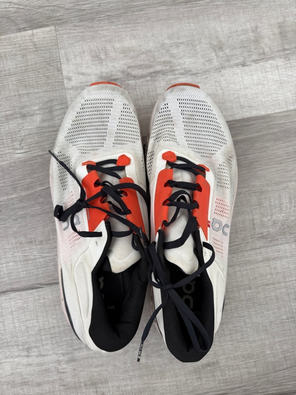 Men’s White and Orange on Cloud Athletic Sneakers with Black Laces